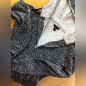 Atmosphere hooded jacket open front zipper. Warm. Used three seasons.